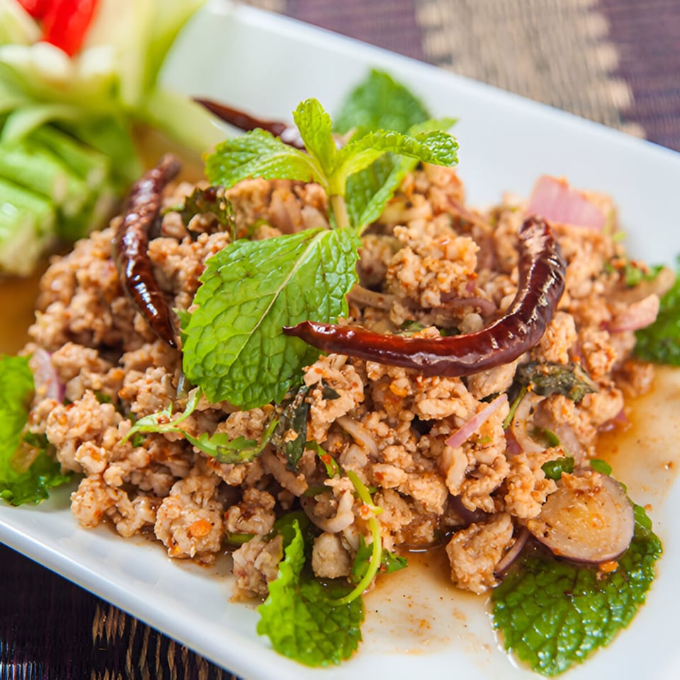 Thai Larb Gai, a minced chicken salad with mint, red onions, and dried chilies.